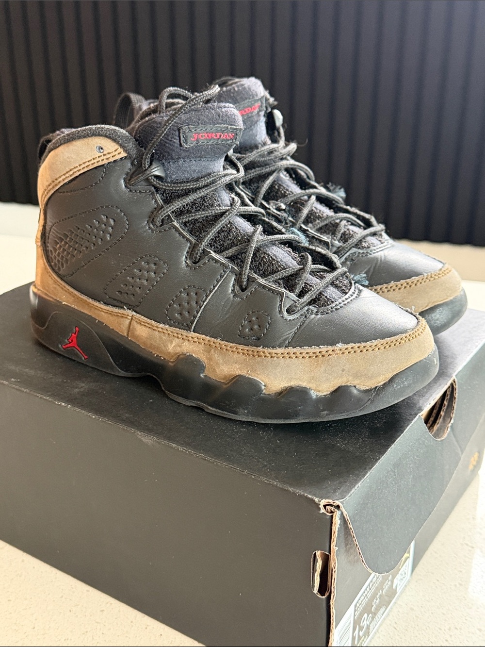Jordan Kids Black and Brown High-Top Sneakers with Red Jumpman